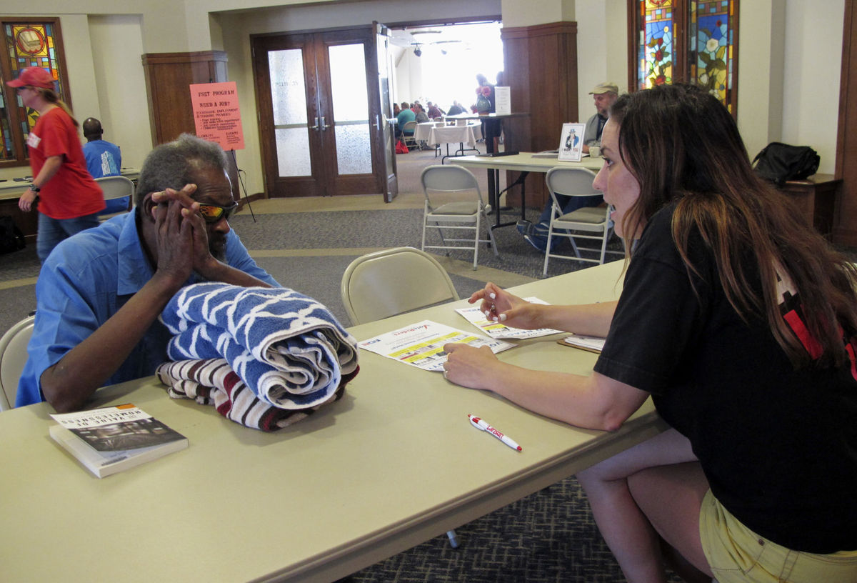 Molly helping voter at voter ID clinic