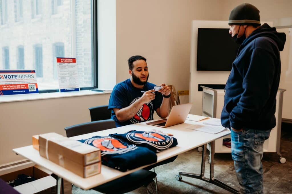 Nick Ramos providing ID assistance to a Wisconsin voter