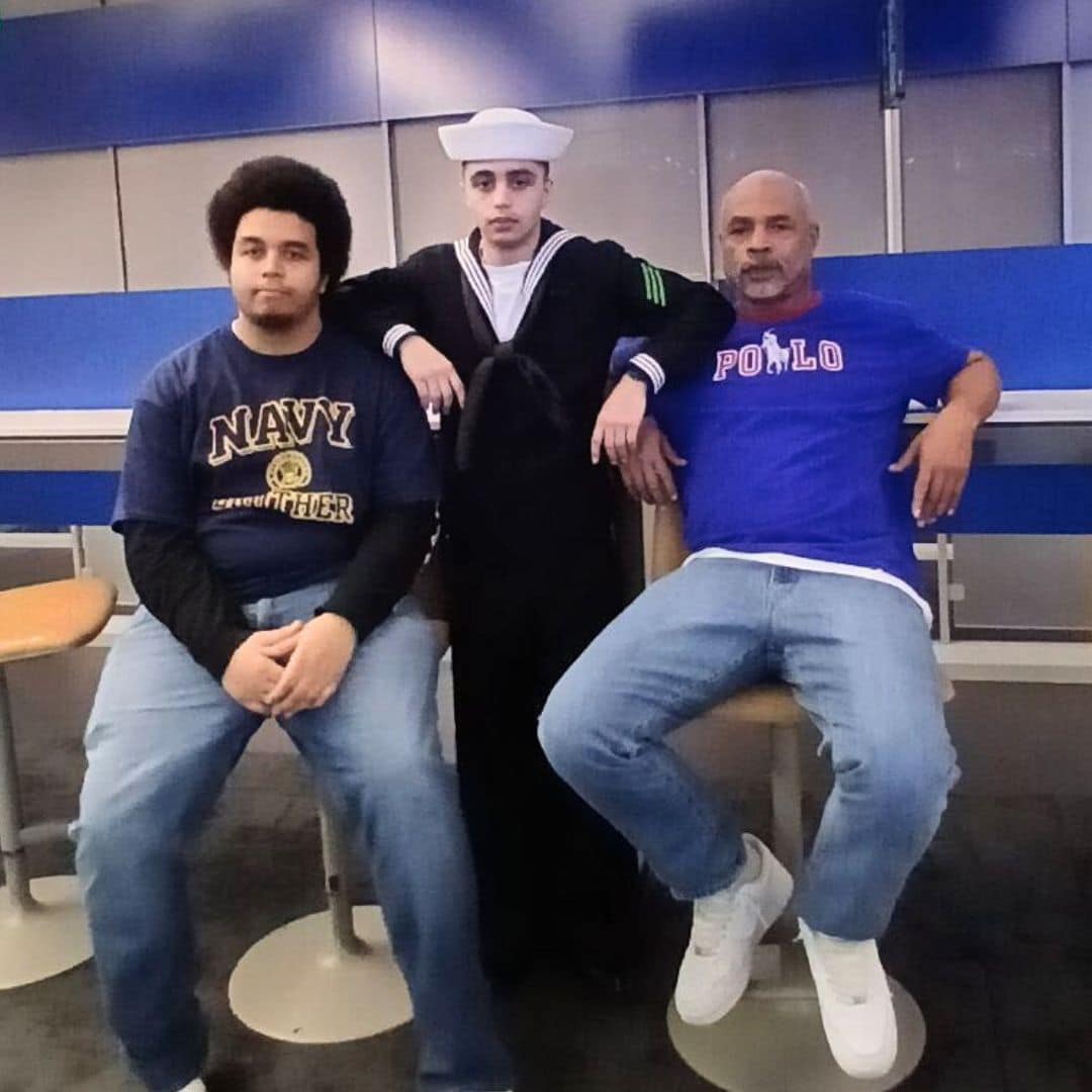 Edward (far right) with his two sons